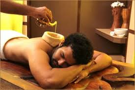 Man receiving a Greeva Basti an Ayurvedic massage therapy designed to alleviate pain, stiffness, and discomfort in the neck and cervical spine region
